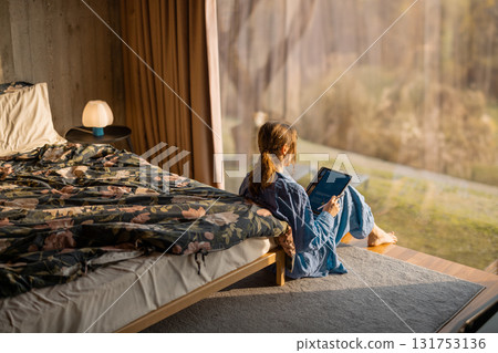Reading in Morning Light 131753136