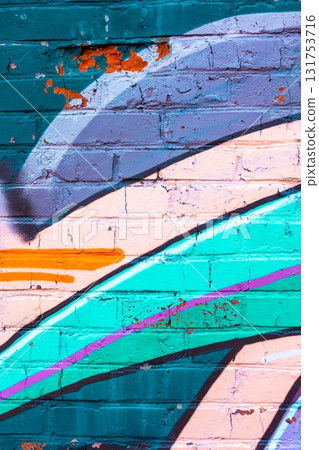 Vibrant Graffiti on Brick Wall in 90s Style with Bold Neon Colors 131753716