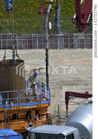 Ground improvement work using the earth drill method at a large apartment building construction site 131753740
