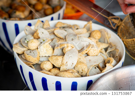 Assorted Fish Balls and Fried Fish Cakes in Large Bowl at Thai Street Food Stall Assorted Fish Balls and Fried Fish Cakes in Large Bowl at Thai Street Food Stall 131753867