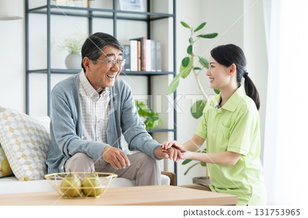 Care worker and senior man 131753965