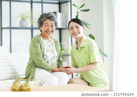 Care worker and senior woman 131754324