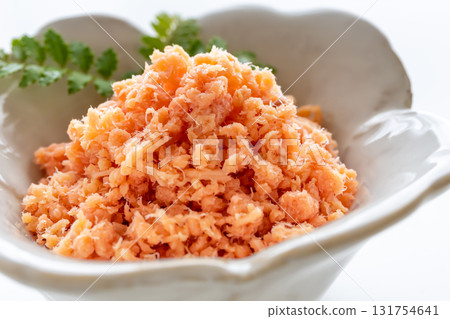 Salmon flakes on a white background Salmon flakes on a white background 131754641