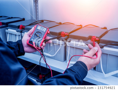 Electrical measurements with multimeter tester. Electrical background. 131754921