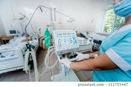 Doctor give resuscitation to patient in the emergency room. Cardiac massage Doctor give resuscitation to patient in the emergency room. Cardiac massage 131755447