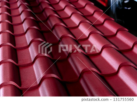 Red metallic roof tiles background with drops of water. Red metallic roof tiles background with drops of water. 131755560