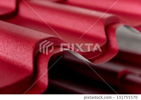 Red metallic roof tiles background with drops of water. 131755570