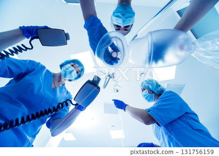 Doctors give resuscitation to a male patient in the emergency room. Doctors give resuscitation to a male patient in the emergency room. 131756159