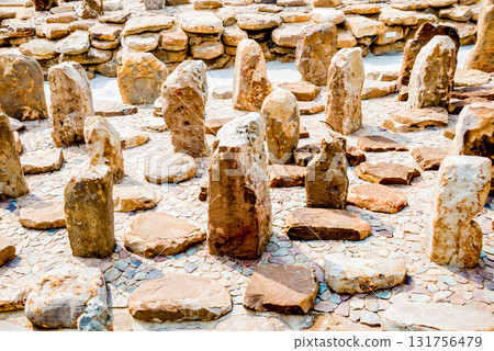 Stones pyramids in the garden. Background and texture. Stones pyramids in the garden. Background and texture. 131756479