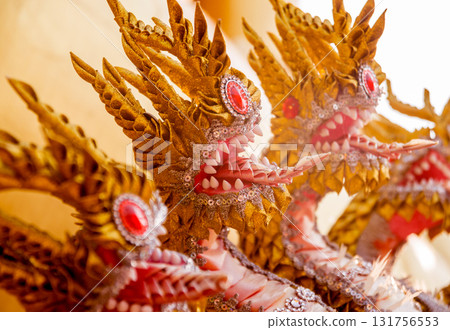 Symbols of Buddhism. South-Eastern Asia. Details of buddhist temple in Thailand. 131756553