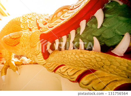 Symbols of Buddhism. South-Eastern Asia. Details of buddhist temple in Thailand. 131756564