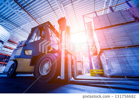 Forklift loader in storage warehouse ship yard. Distribution products.  131756682