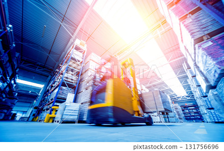 Forklift loader in storage warehouse ship yard. Distribution products.  131756696