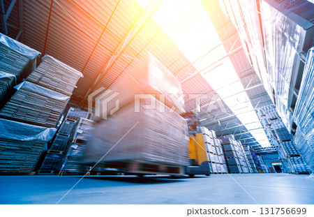 Forklift loader in storage warehouse ship yard. Distribution products.  131756699