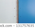 Spiral bound lined notebook with blue page 131757635