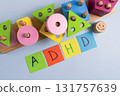 ADHD abbreviation on multi-colored paper and colorful blocks. Attention Deficit Hyperactivity Disorder concept 131757639
