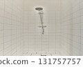 A sleek shower stall featuring white tiled walls and a contemporary showerhead. The minimalist design offers a clean and refreshing aesthetic. 131757757
