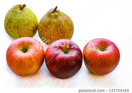 Autumn flavors: pears and red apples 131759169