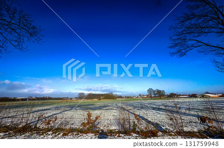 A Beautiful and Serene Winter Landscape Set Under a Clear Blue Sky with No Clouds in Sight A Beautiful and Serene Winter Landscape Set Under a Clear Blue Sky with No Clouds in Sight 131759948