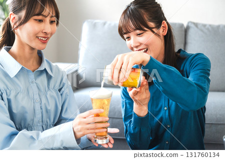 A woman poured beer A woman poured beer 131760134