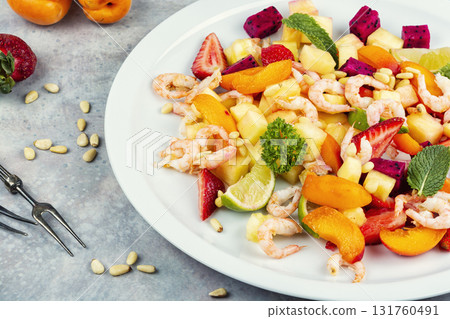 seafood salad and exotic fruits. 131760491