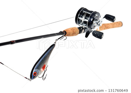 fishing rod, reel, wobbler, braided fishing line metal leash jerk, white background, close-up 131760649