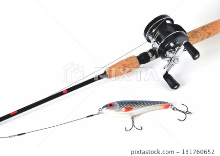 fishing rod, reel, wobbler, braided fishing line metal leash jerk, white background, close-up, place for inscription fishing rod, reel, wobbler, braided fishing line metal leash jerk, white background, close-up, place for inscription 131760652