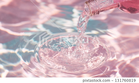 Pouring water into rippling surface Pouring water into rippling surface 131760819