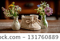 Knit baby booties with fresh flowers 131760889