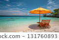 Beach scene with orange umbrella 131760893