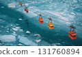 Cable cars cross icy river 131760894