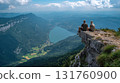 Viewers on mountain cliff 131760900