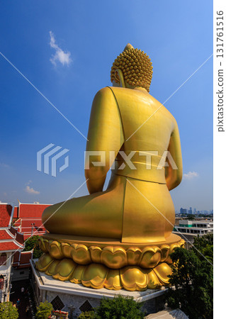 [Bangkok, Thailand] Golden Buddha statue at Wat Paknam in Luang Por Sod [Vertical photo] 131761516