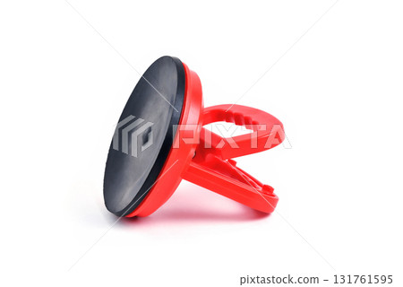 device for carrying glass, vacuum glass suction plate red color close-up 131761595