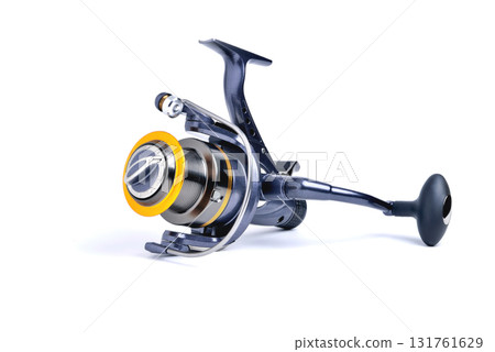 Coil for fishing inertial blue color on white background close-up isolate 131761629