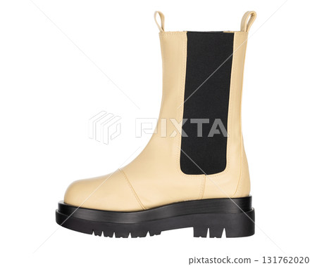 Beige chelsea boot with thick black sole and elastic side panel 131762020