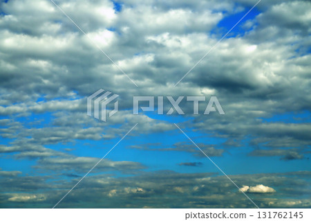 Clouds on the background of bright blue sky, summer day close-up 131762145