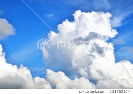 Clouds on the background of bright blue sky, summer day close-up 131762164