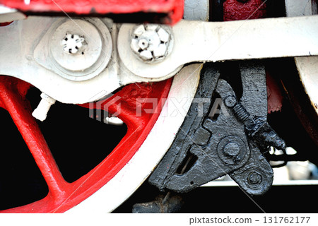 Part of the old railway locomatine standing on the rails, close-up 131762177