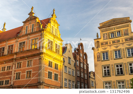 Gdansk, a city on the Baltic coast of northern Poland, Europe. Historic buildings with intricate facades rise against a clear sky, showcasing traditional European architecture in an urban setting. 131762496
