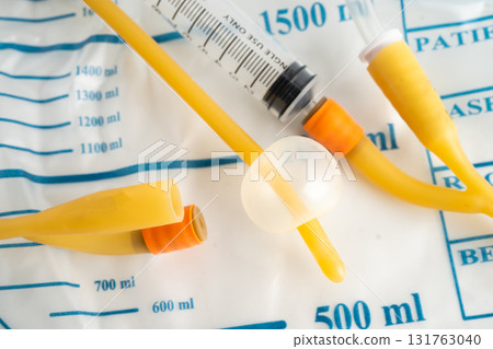 Foley catheter and urine drainage bag collect urine for disability or patient in hospital. 131763040