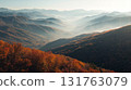 Autumn mountains dyed in vibrant red leaves (1) 131763079