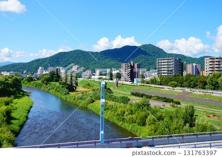 Toyohira River in summer viewed from Horohira Bridge Toyohira River in summer viewed from Horohira Bridge 131763397