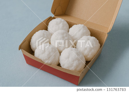 Creative fast food concept with snowballs, unconventional ingredients presented as meal in takeout box on blue background, AI Generative 131763783