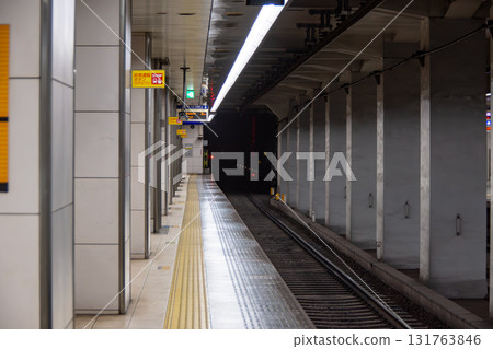 Platform and tracks at Tenmabashi Station on the Keihan Railway 131763846