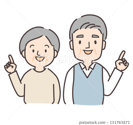 Senior couple pointing with a smile 131763871