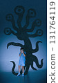 Bold poster. Little boy reacting with fear before tentacle monster shadow on blue background 131764119