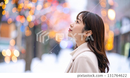 Woman watching snow in a townscape. Text space. Background material. 16:9 size. AI-generated material. 131764622