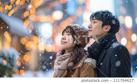 Couple watching snow in a townscape. Text space. Background material. 16:9 size. AI-generated material. 131764627