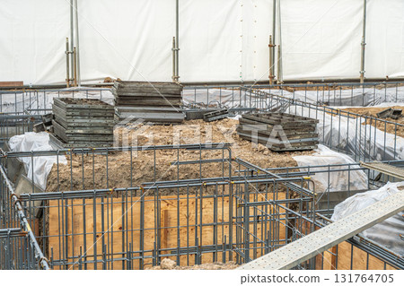 Residential construction site: Reinforcement bars and foundation work 131764705